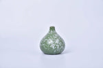 Sand white speckled round ceramic bud vase