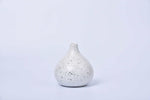 Sun yellow speckled round ceramic bud vase