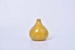 Bamboo green speckled round ceramic bud vase