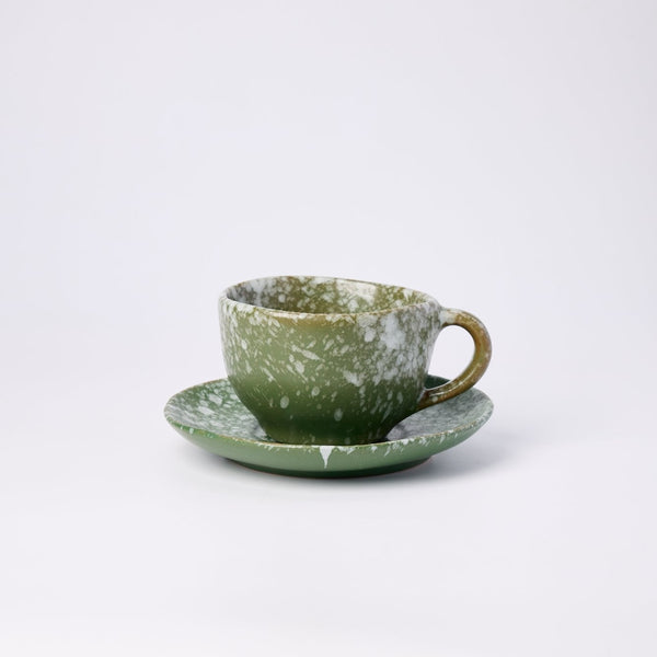 Sand white speckled ceramic coffee cup and saucer